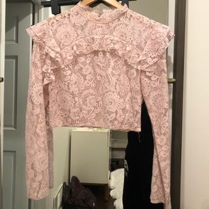 Light pink lace top with ruffle detail.